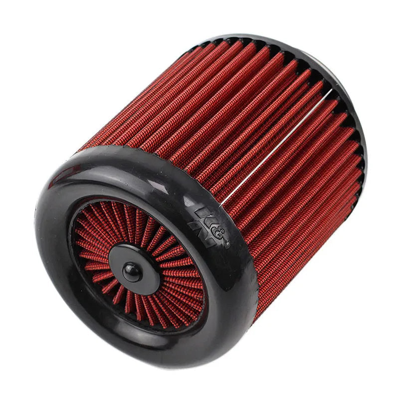 Red air filter with black outer rim on a white background.